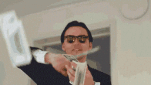 Gif animado de hombre tirando dinero al aire